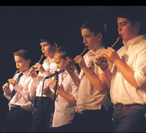 Tin whistle players performed a medley as part of the Trad Youth Exchange concert.